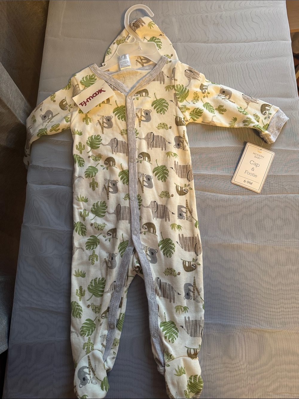 T.J.Maxx Cream One-Piece Footed Pajamas with Green & Gray Jungle Print